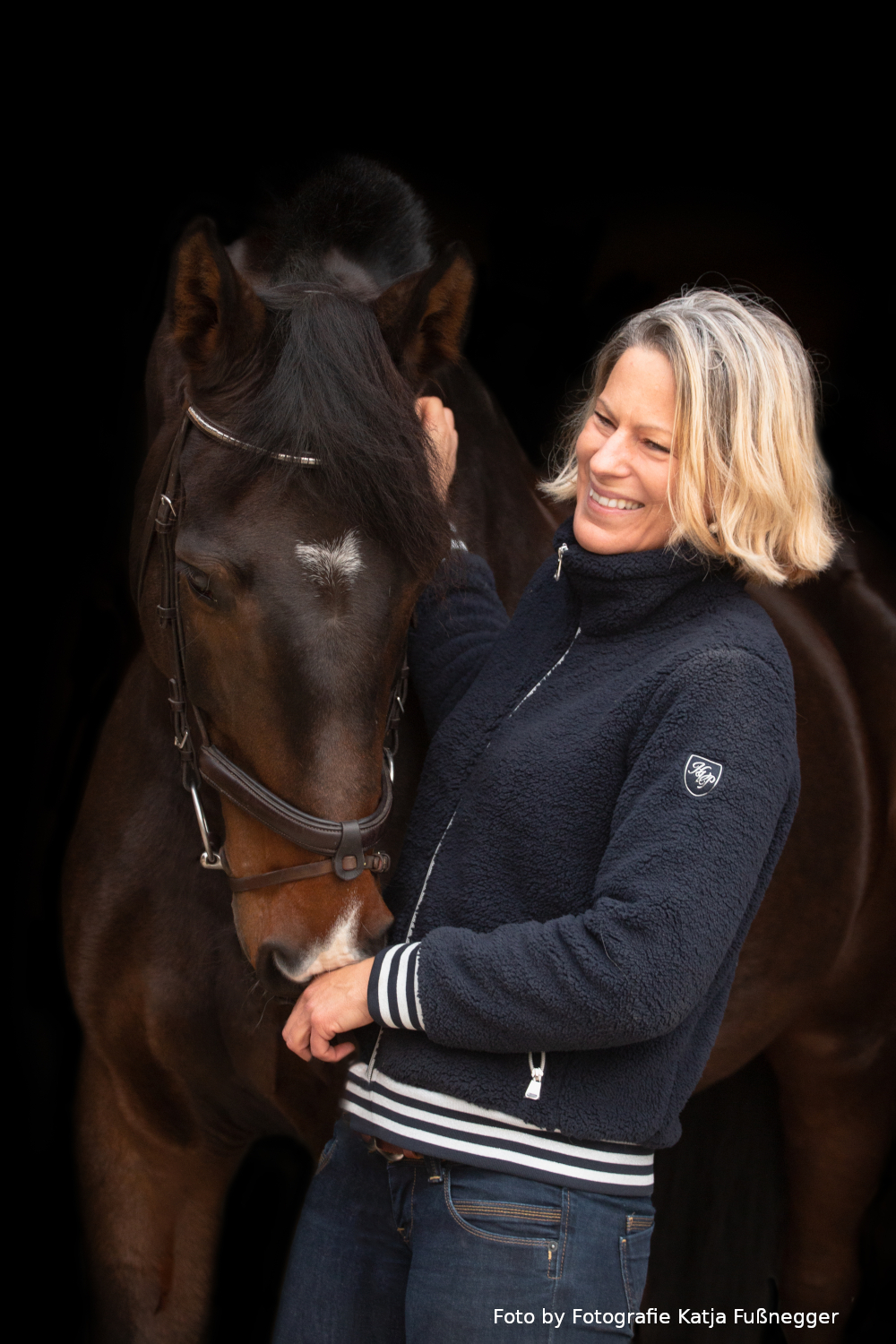 Frau mit Pferd